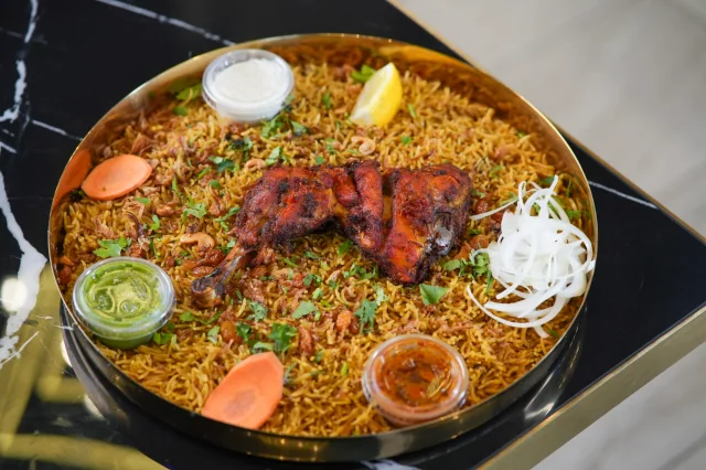 Chicken mandi served over fragrant basmati rice